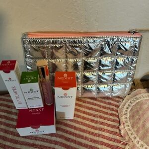 New Clinique cosmetic bag with $110
NEXXT and Josie Maran pink blossom lippie